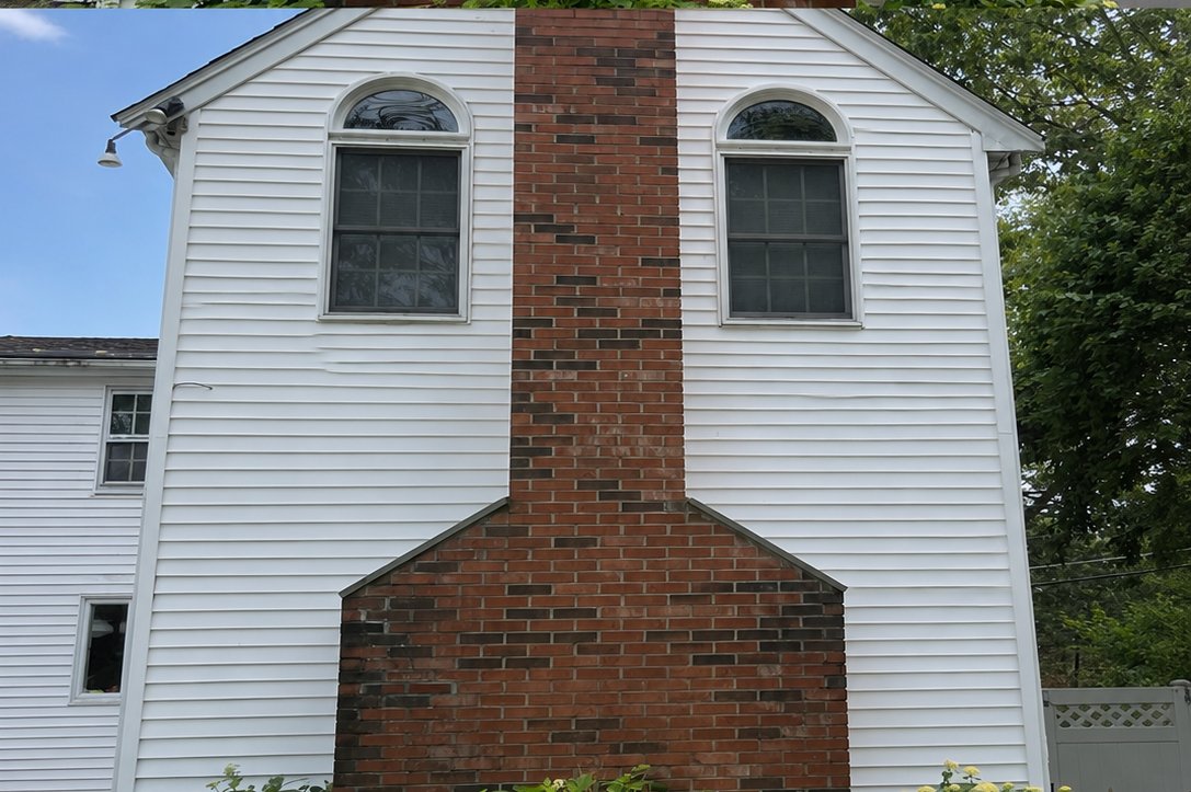 House siding after soft washing by Cedar Services