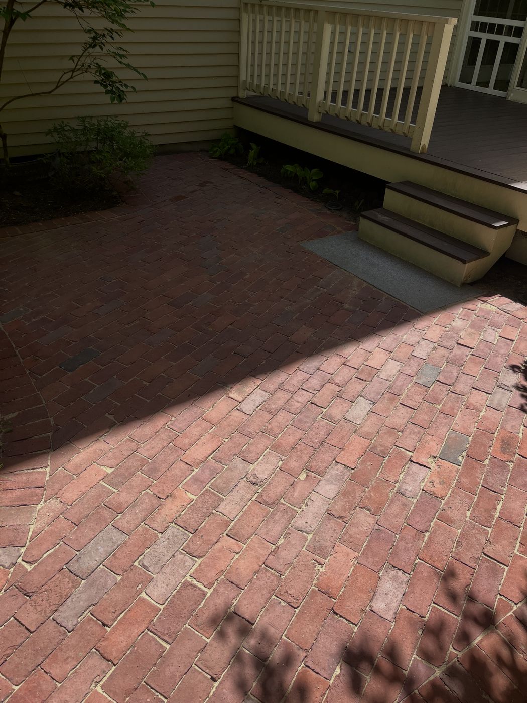 Brick patio after washing and re-sanding