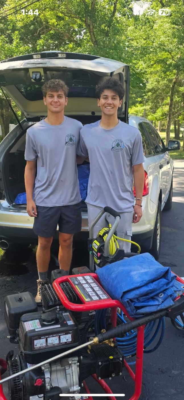 Andrew Easton and Nicolas Demien of Cedar Services with their equipment